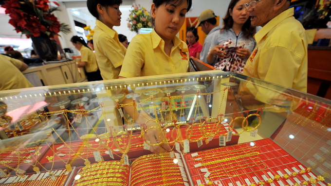Vàng lao dốc, cổ phiếu vàng lao đao Vàng lao dốc, cổ phiếu vàng lao đao