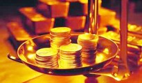Vàng dao động gần ngưỡng 1.230 USD do nhu cầu mua vàng dữ trữ tăng khi chứng khoán rớt giá